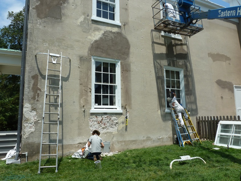 Painting and stucco repair in progress at Andalusia, Bucks County.