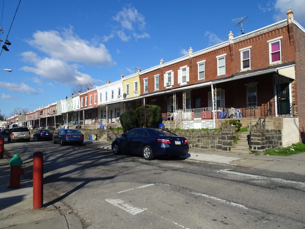 Castle Row (above, 1888) and Battleship Row (below, 1880) in Tacony. Examples of housing built specifically to house Henry Disston’s incoming labor force in Tacony. Workers’ rowhomes were historically part of a building-and-loan program established by Disston as part of his comprehensive company town. Photo by Jenn Robinson from AECOM Technical Services, Inc., March 24, 2016.