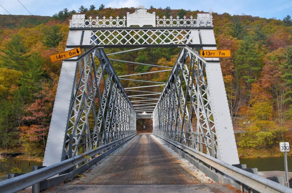 The Upper Slate Run Bridge carries PA 414 over Pine Creek in Lycoming County is in the only example of a Quadruple intersection Warren thru truss in the state. Courtesy of historicbridges.org. 2016. Used by permission of Nathaniel Holth.