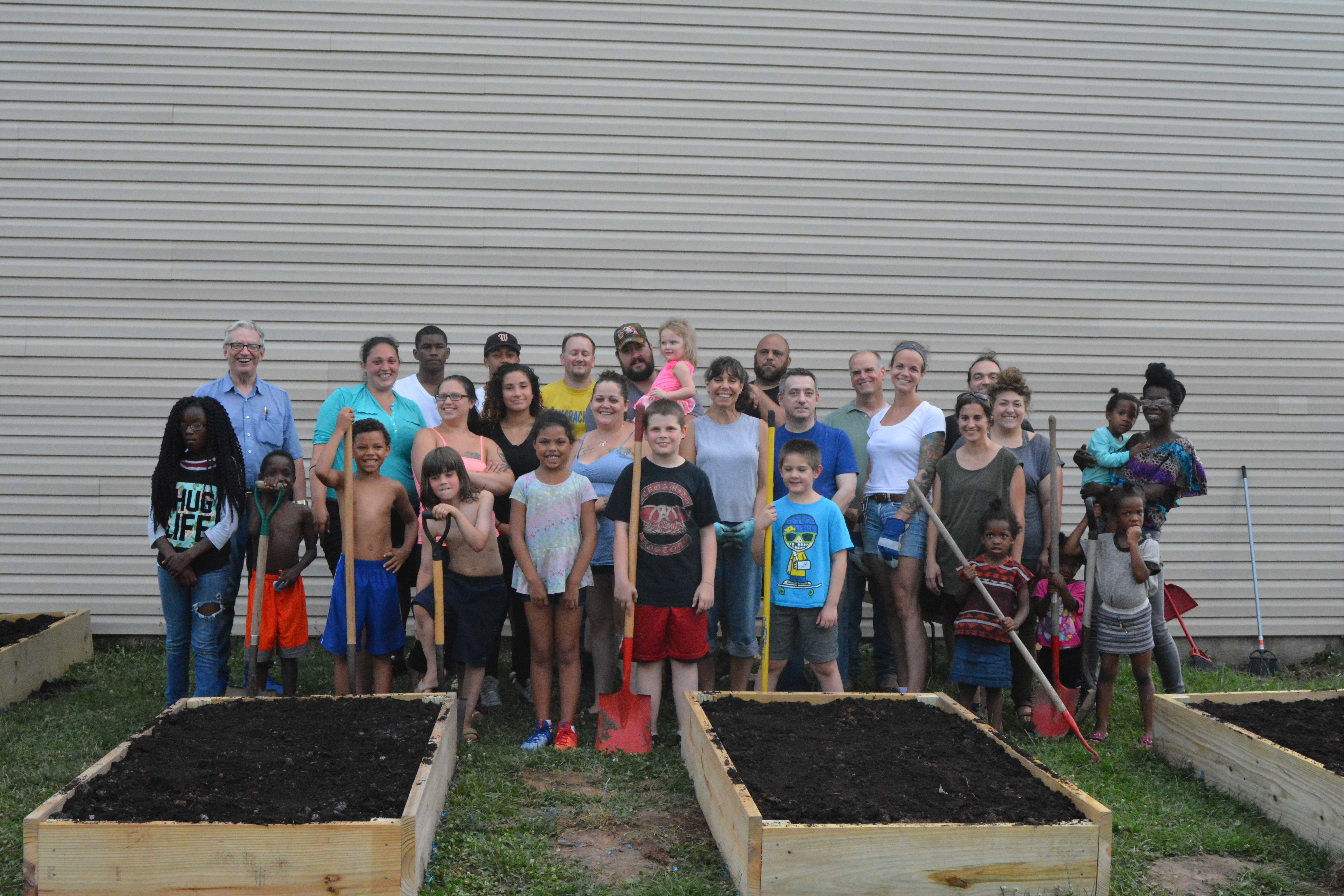 Williamsport residents young and old contribute to the Second Street Community Garden Project. Photo by Heart of Williamsport team, 2017. Used be permission.