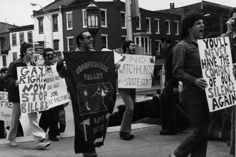 Men marching with signs