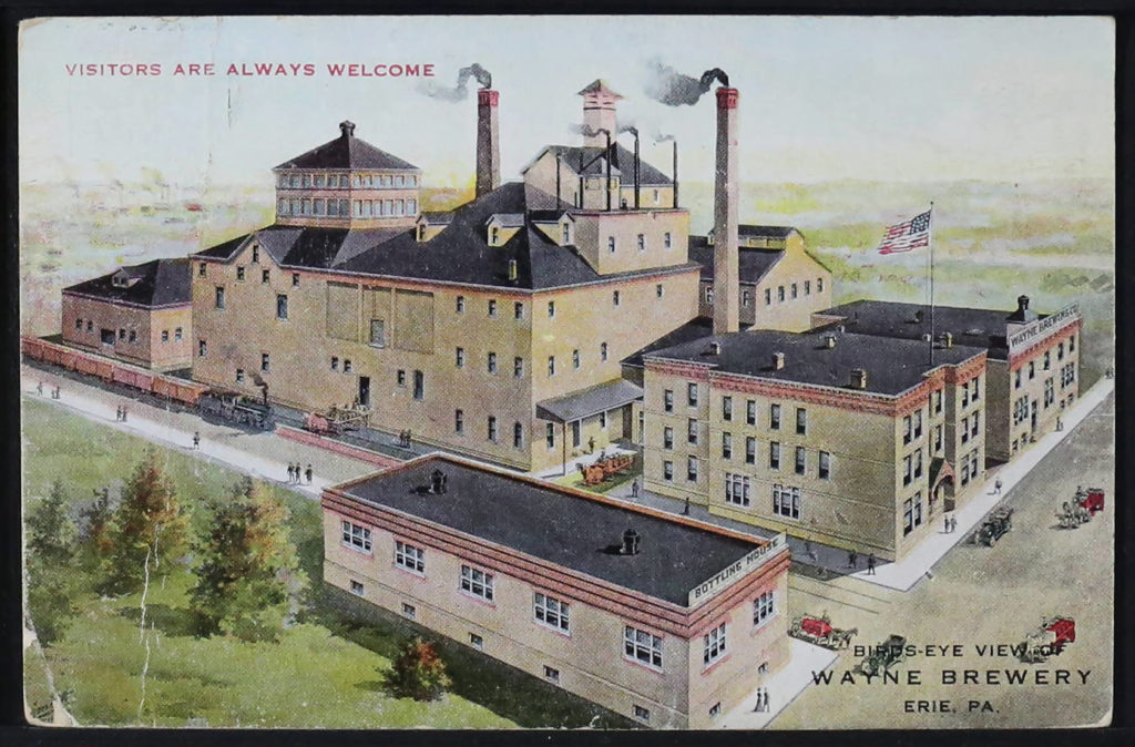 Postcard showing a large grouping of white buildings.