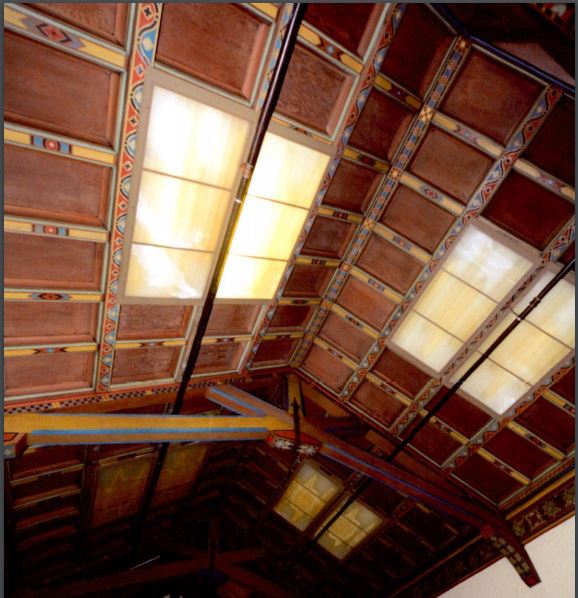 Wood ceiling with deocrative stenciling.