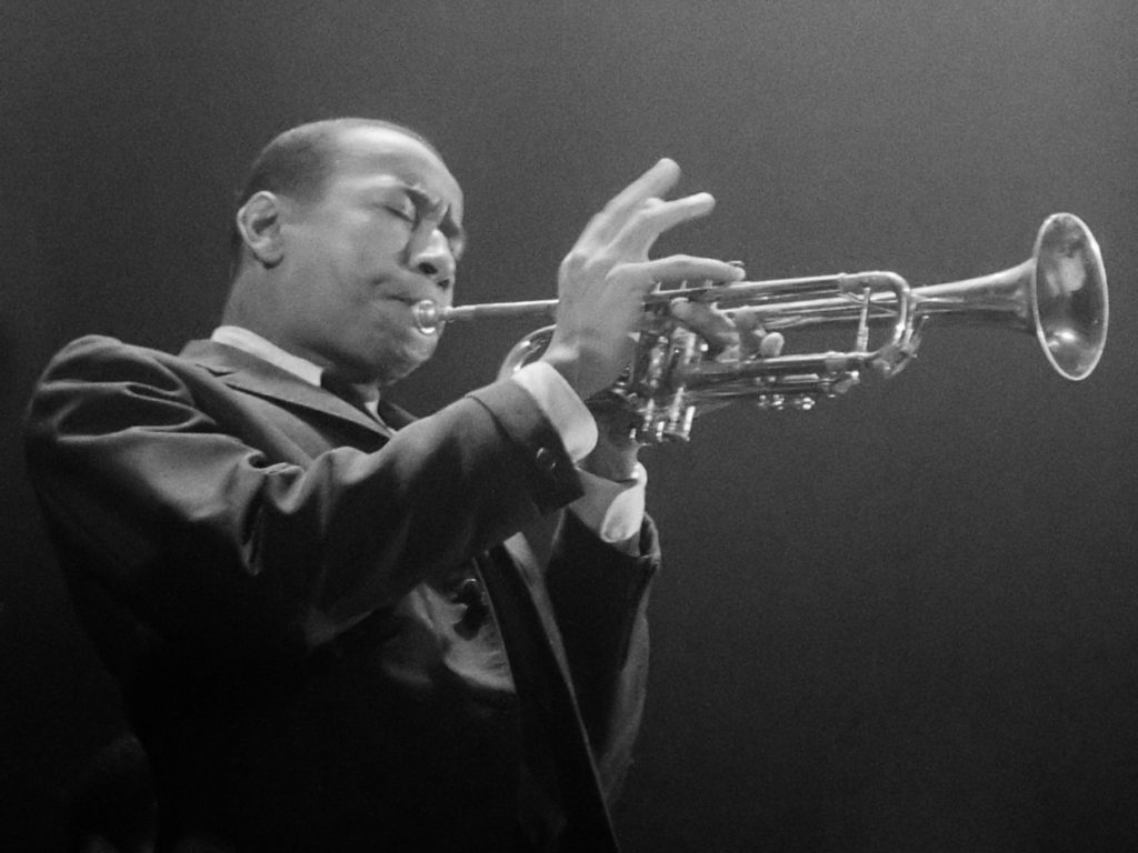 Man playing a trumpet.