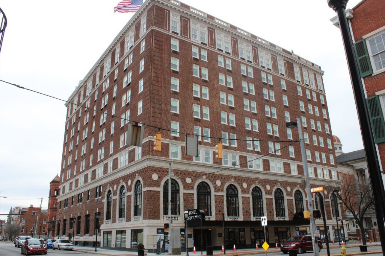 Large brick hotel in downtown.