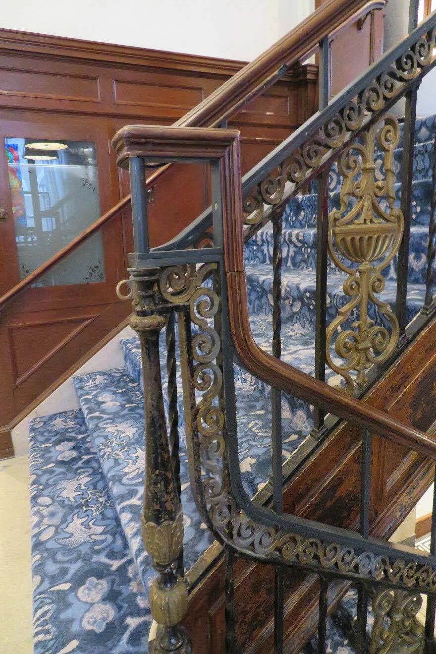Decorative metal stair railing.