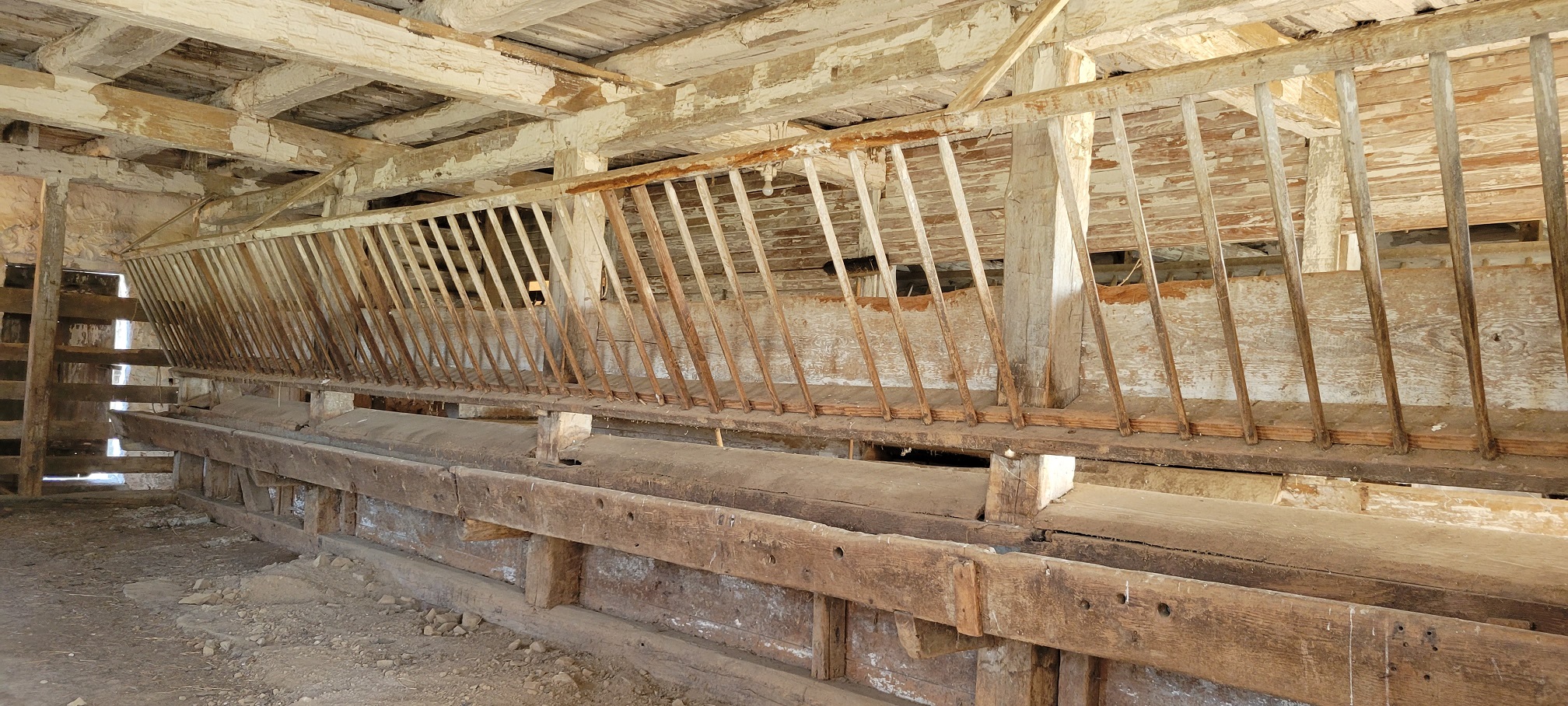 Interior wood structure of barn.