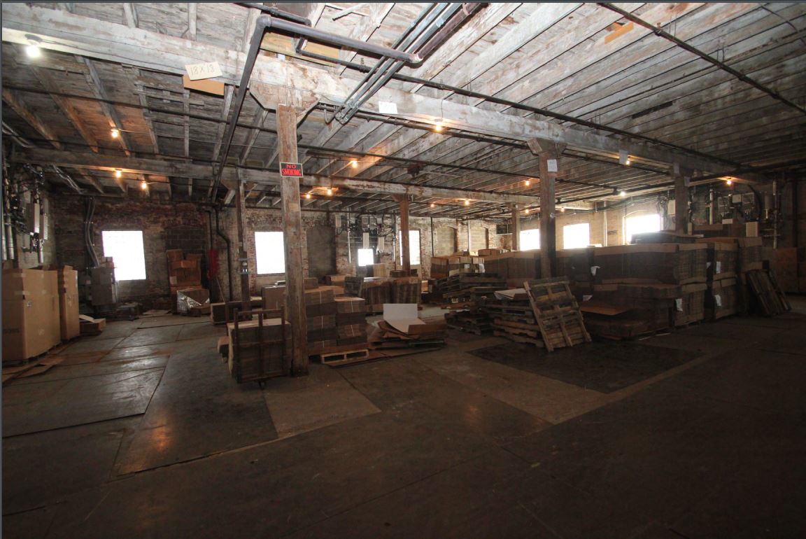 Large open interior industrial space.
