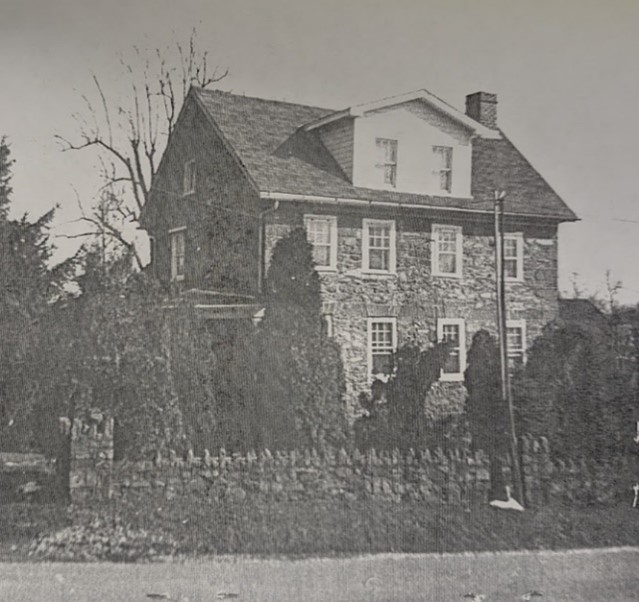 Two story stone farmhouse.