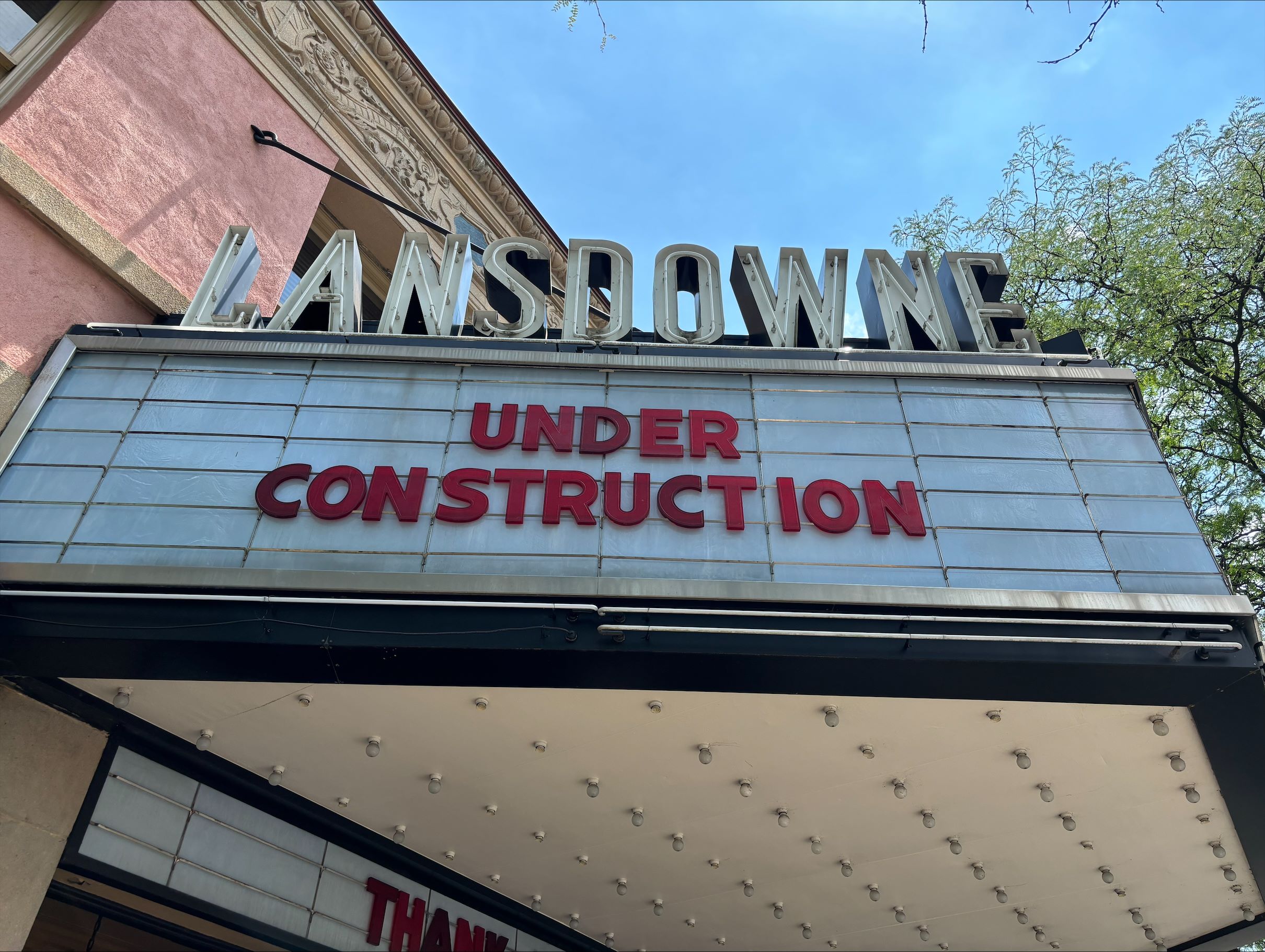 Theater sign that reads "under construction".