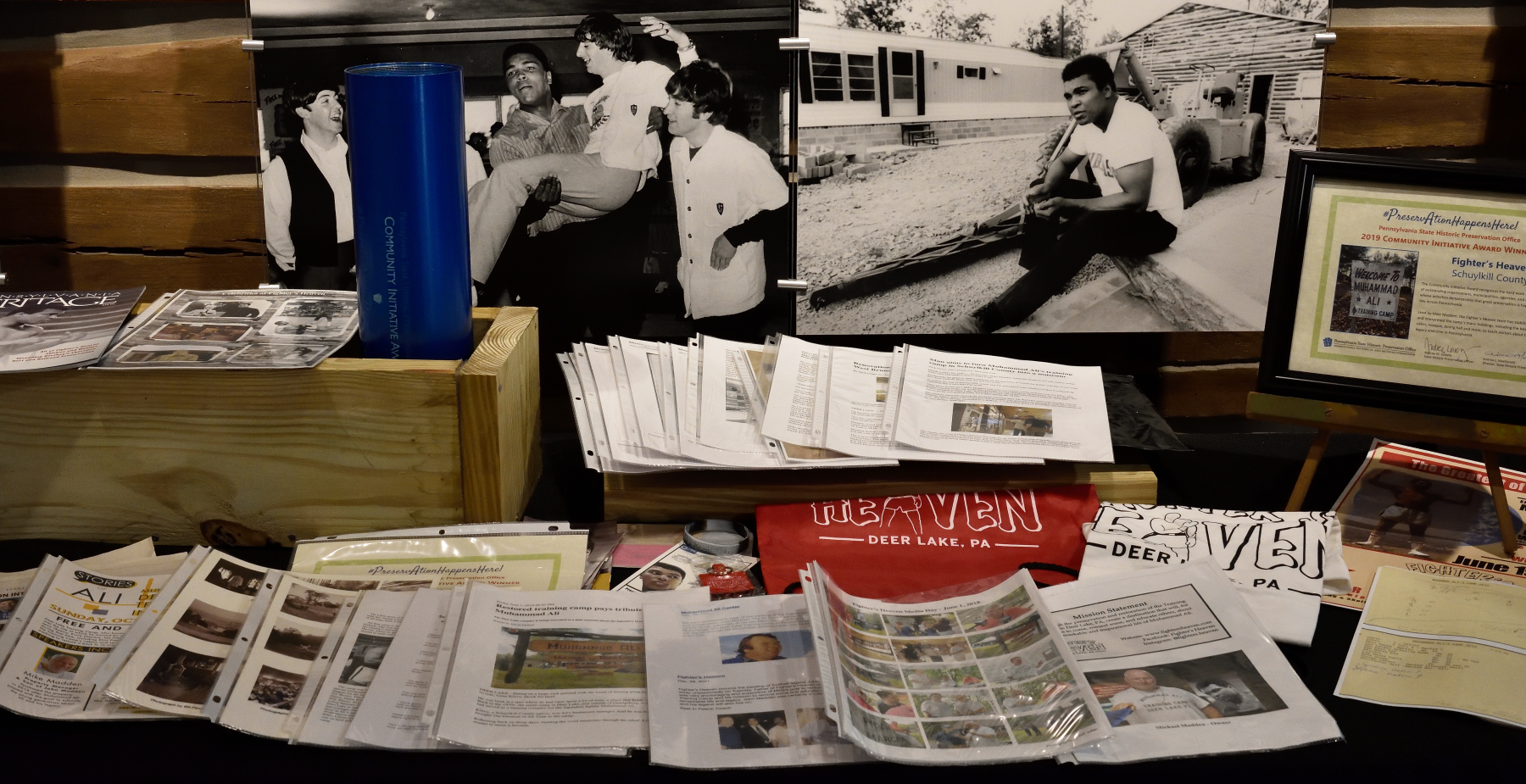 Table covered with papers.