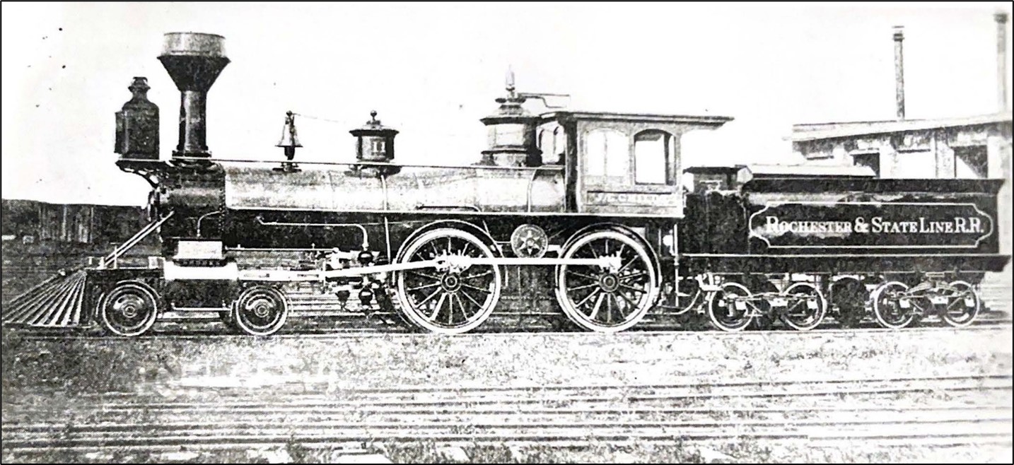 Train engine and car on a track.