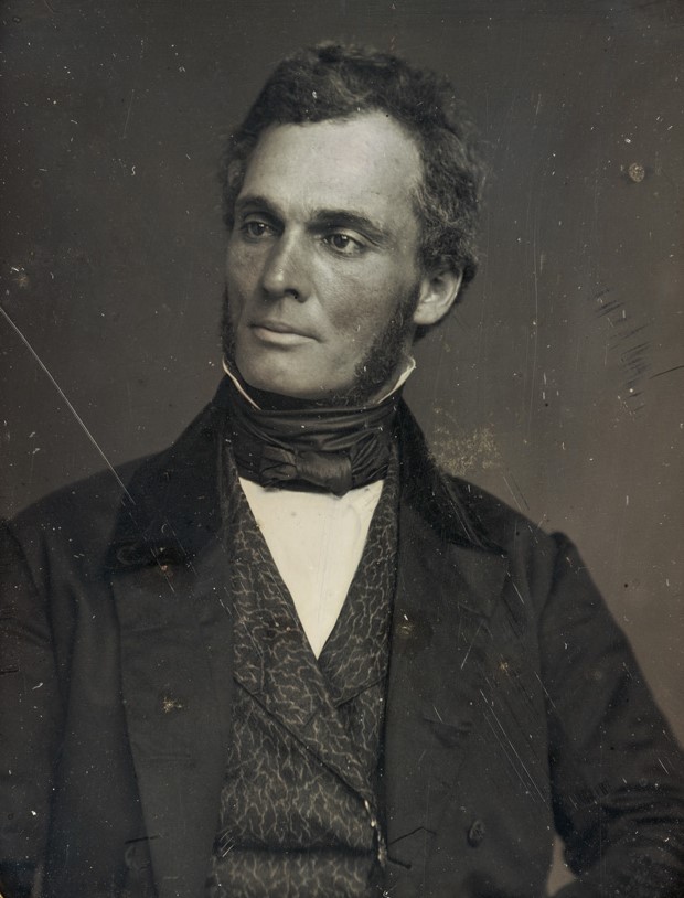 Portrait photograph of a man in old-fashioned dress.